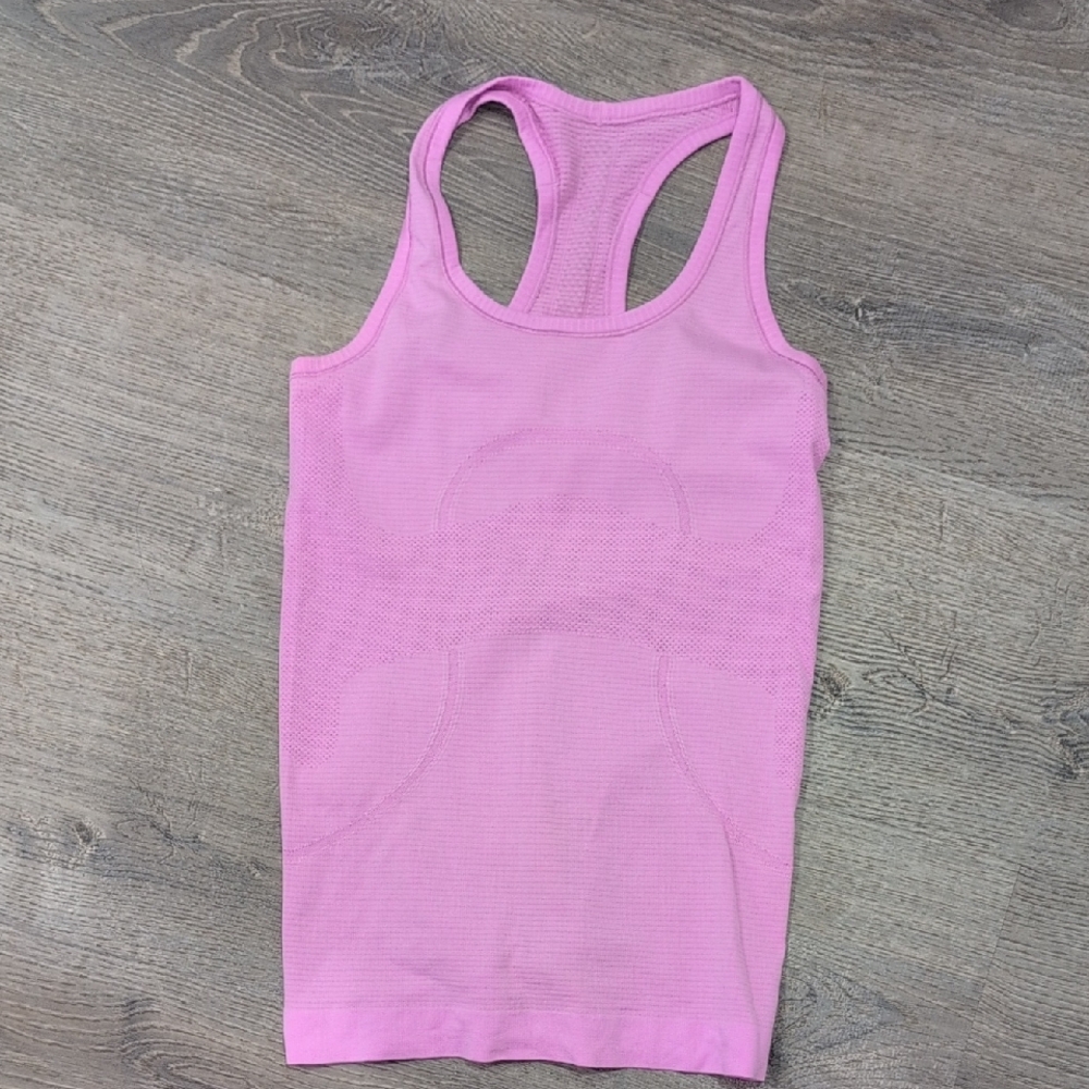 like new bubble gum pink lululemon top